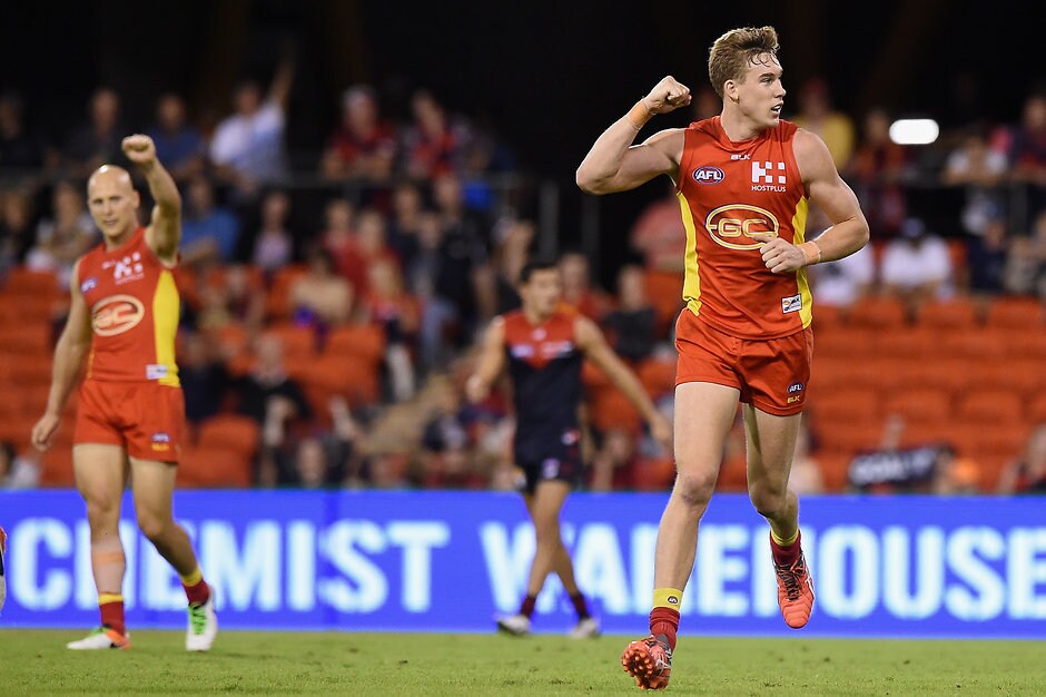 AFL 2016 Rd 07 - Gold Coast v Melbourne GOLD COAST, AUSTRALIA - MAY 7: Tom Lynch of the Suns celebrates kicking a goal during the 2016 AFL Round 07 match between the Gold Coast Suns and the Melbourne Demons at Metricon Stadium, Gold Coast on May 7, 2016. (Photo by Matt Roberts/AFL Media)